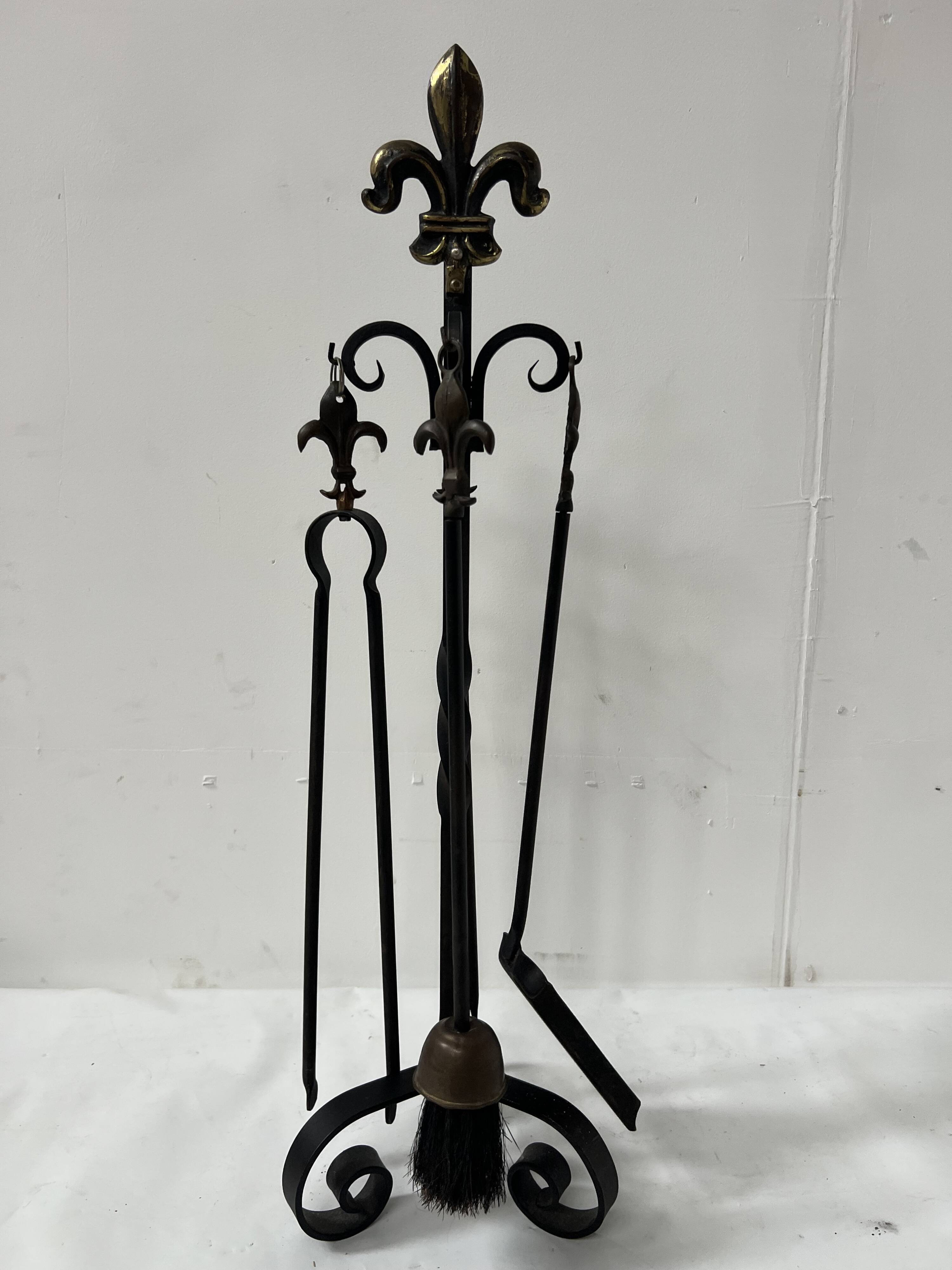 20th century wrought iron and bronze fireplace set