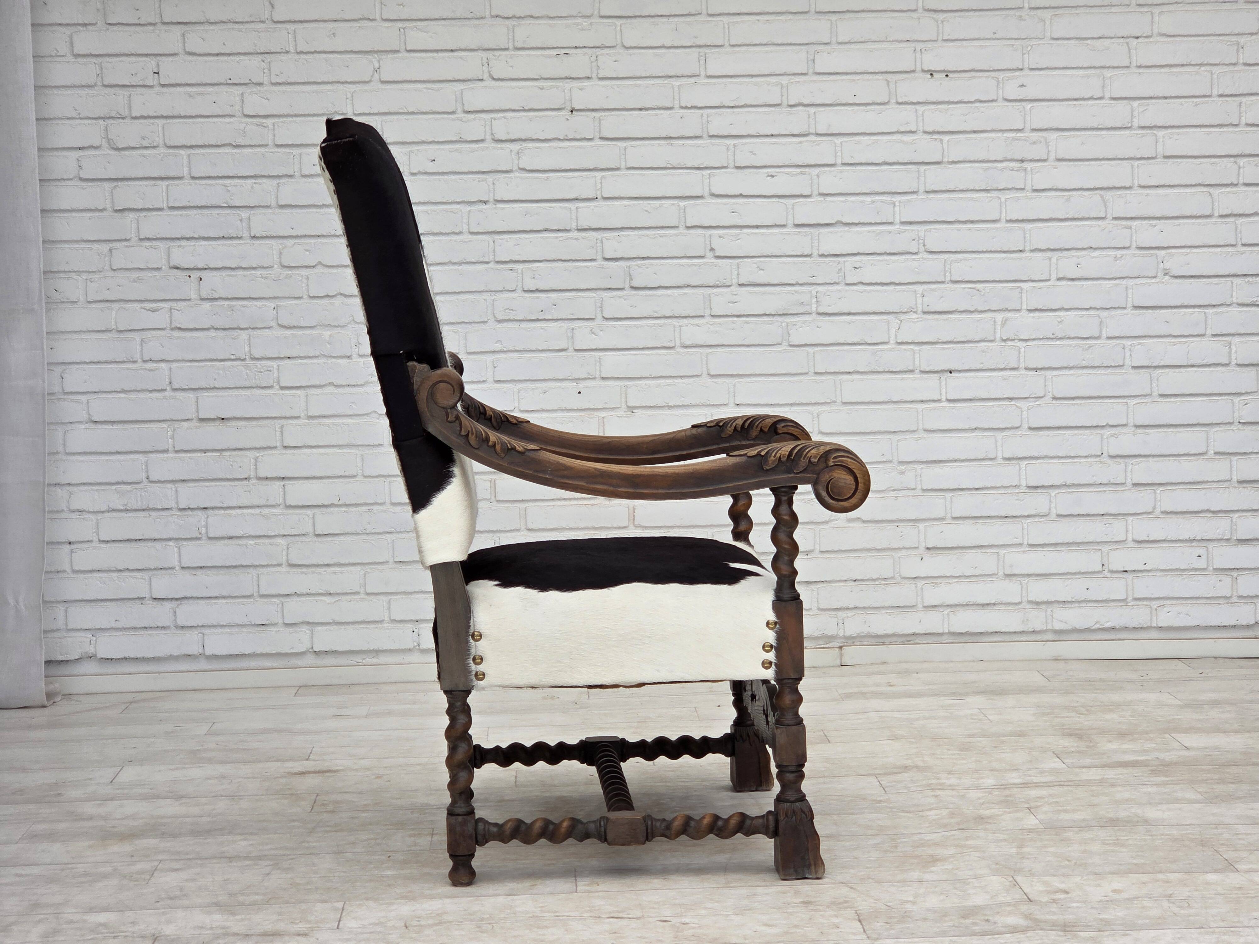 1950s, Danish highback armchair, genuine cowhide, oak wood.