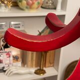 Red Baumann parrot coat rack