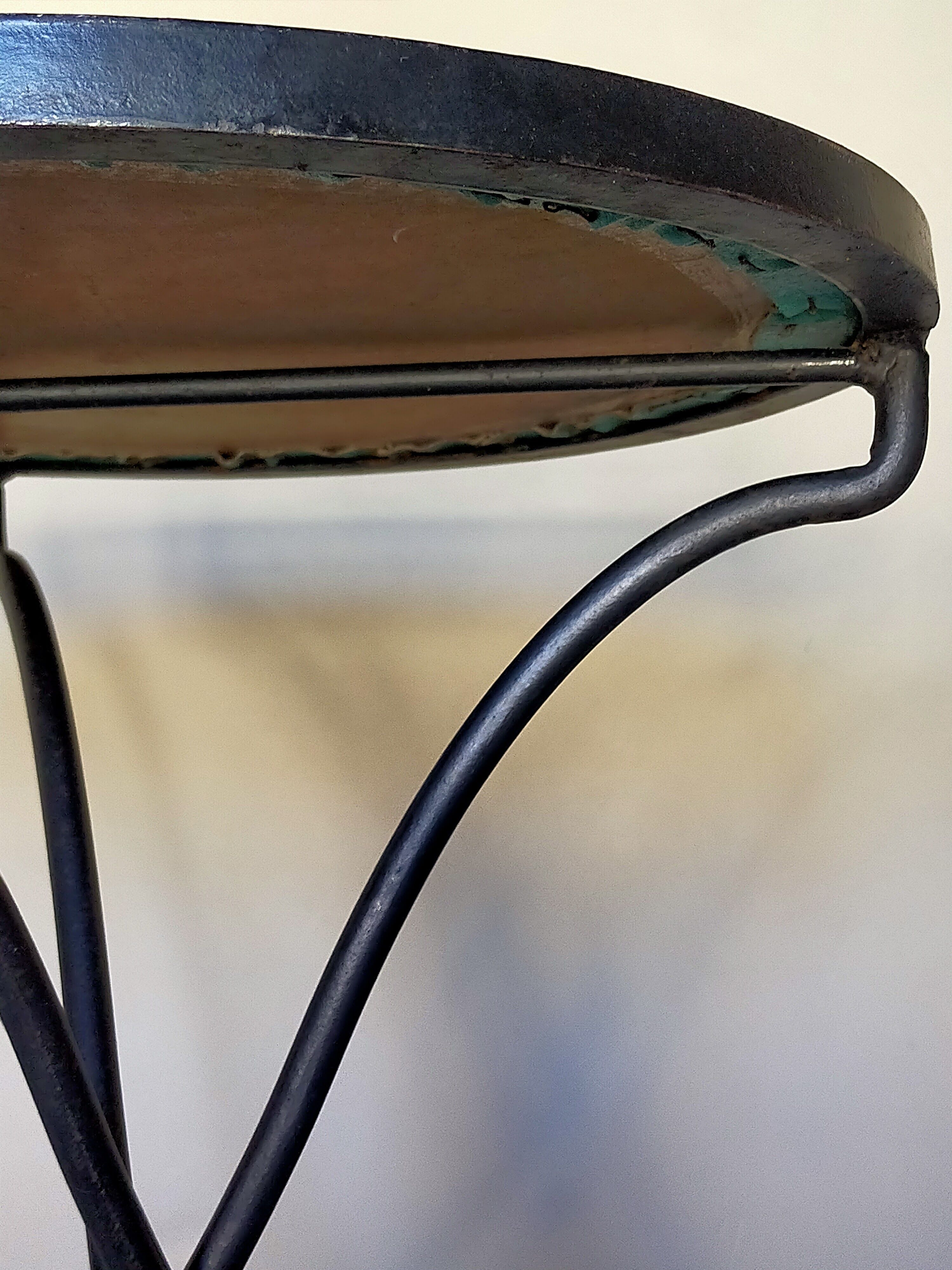 Wrought iron tripod healing in the 1950s