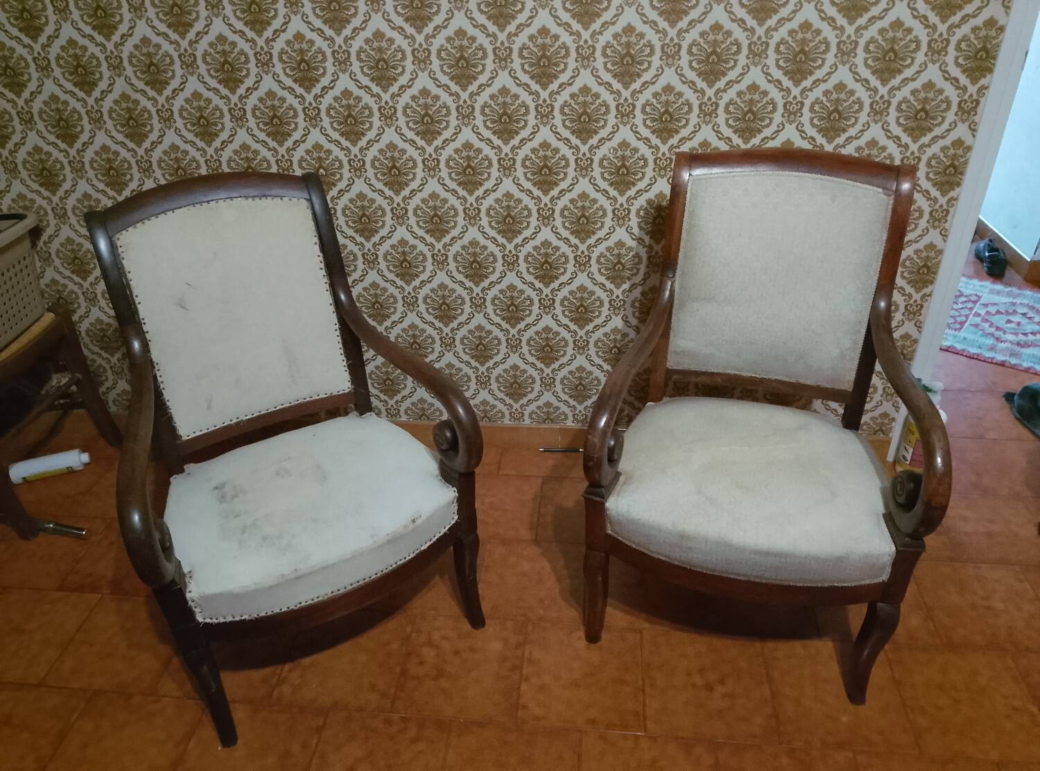 A pair of Empire period armchairs.