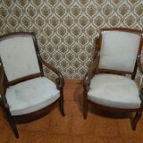 A pair of Empire period armchairs.