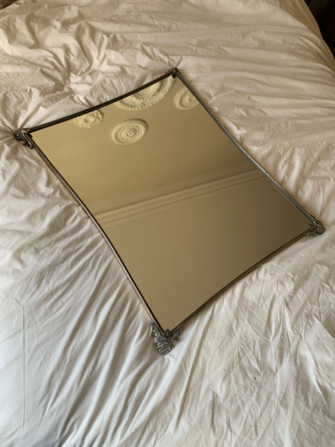 Silver metal mirror curved edge