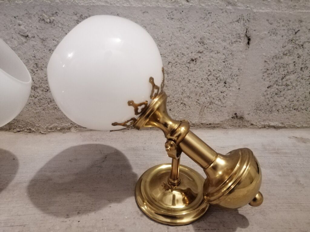 Pair of brass boat swivel appliques - opalin glass globe