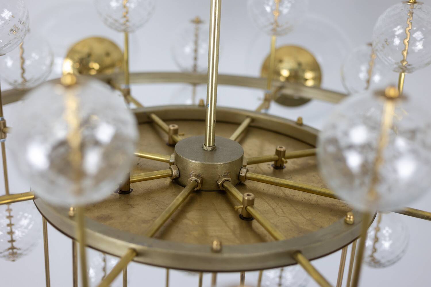 Large chandelier in gilded brass with decorative balls. 1970s.