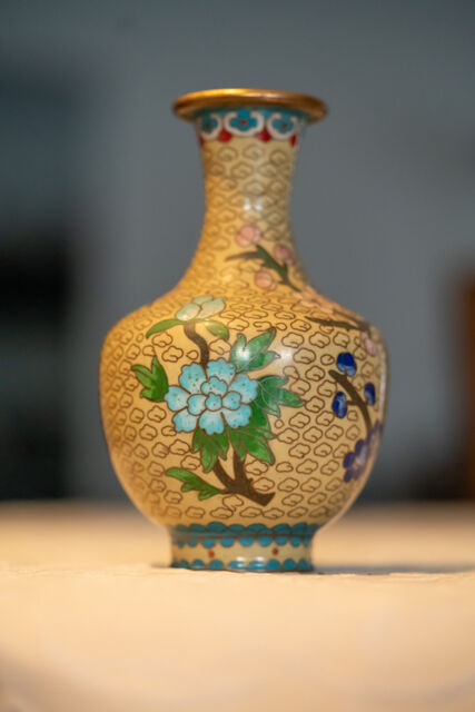 Asian vase decorated with cherry trees