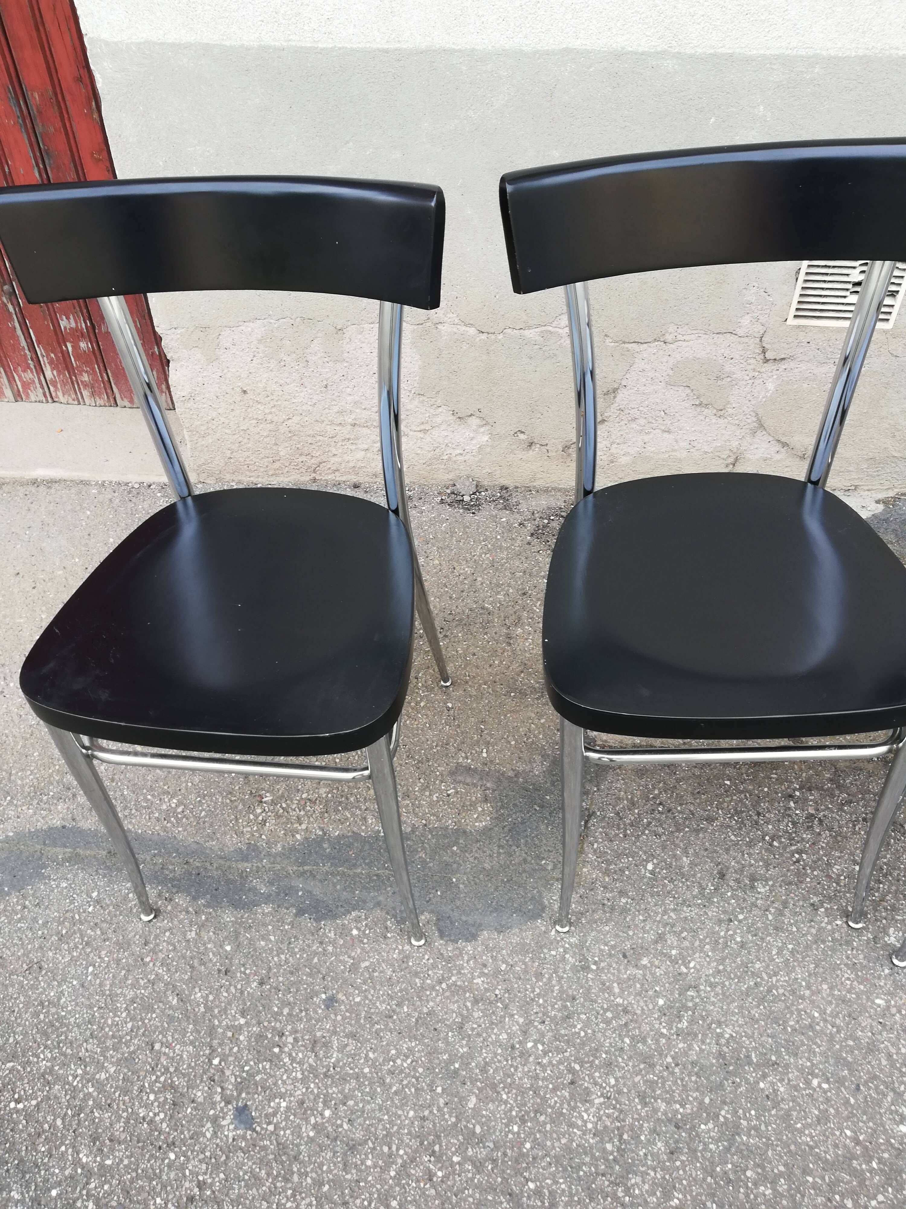 Set of 4 vintage chairs chrome and black wood