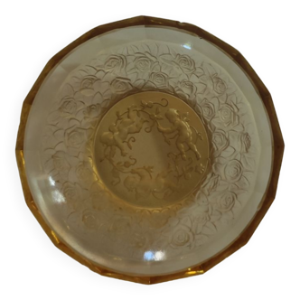 Old empty cup golden yellow glass pocket