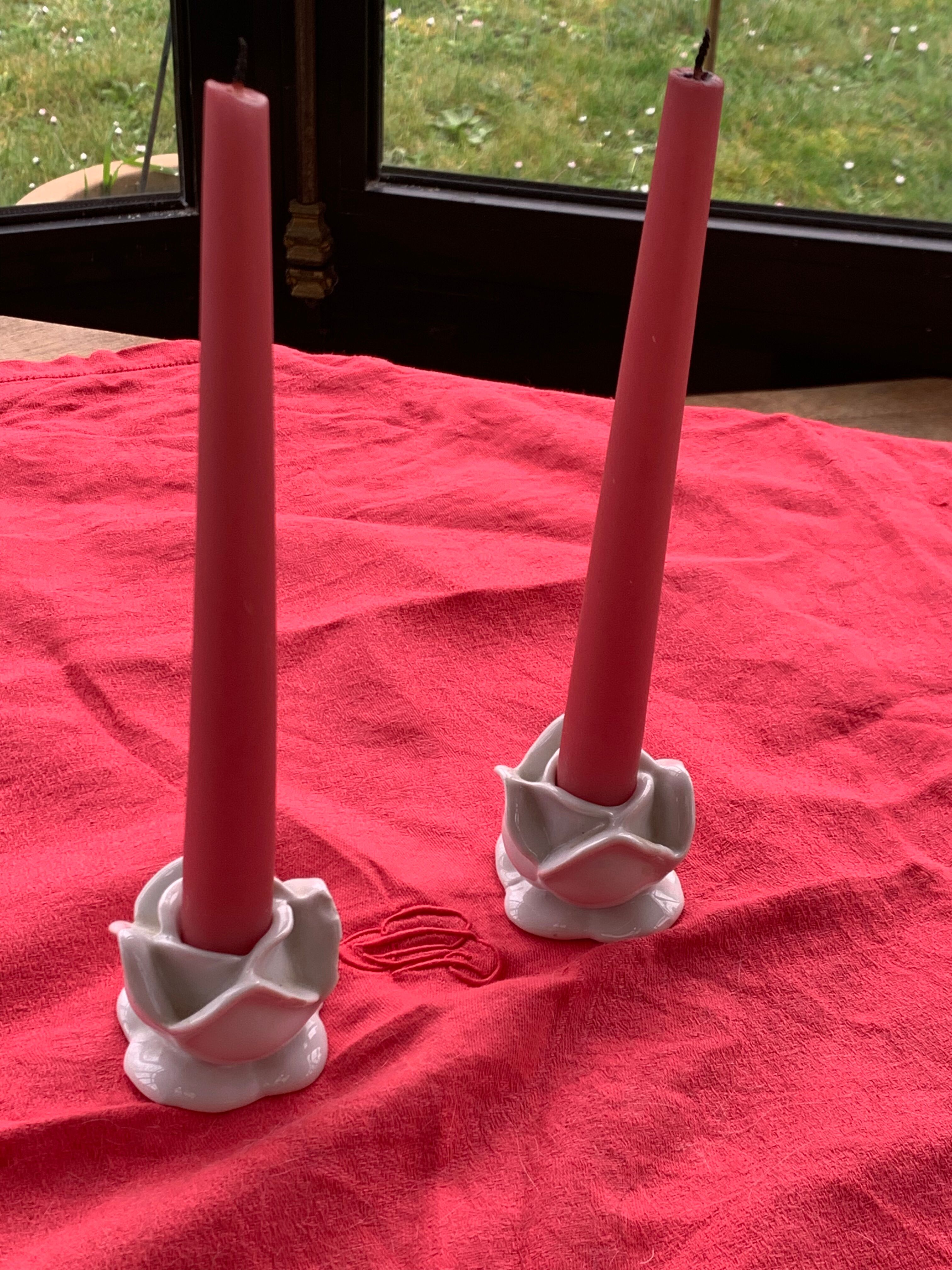 Two vintage white porcelain flower candle holders