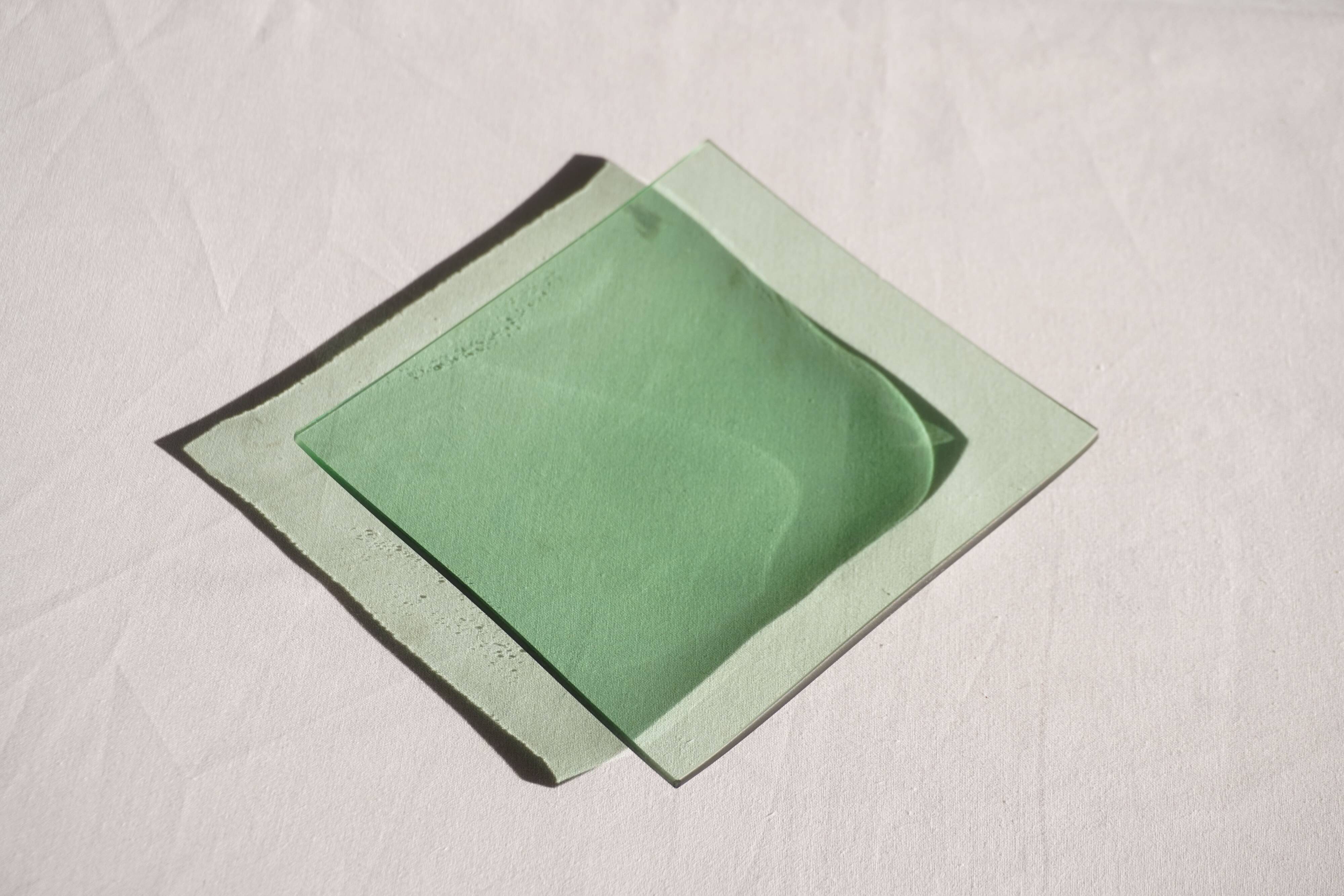 Set of 4 small square green glass plates/bowls