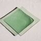 Set of 4 small square green glass plates/bowls
