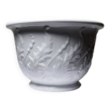 Antique cache-pot in Limoges porcelain with a relief decoration of foliage.