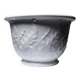 Antique cache-pot in Limoges porcelain with a relief decoration of foliage.