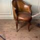 Louis XV style office chair in carved wood, brown leather, circa 1920.