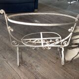 Old wrought iron cradle painted