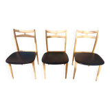 3 Scandinavian-style chairs, light wood and black faux leather