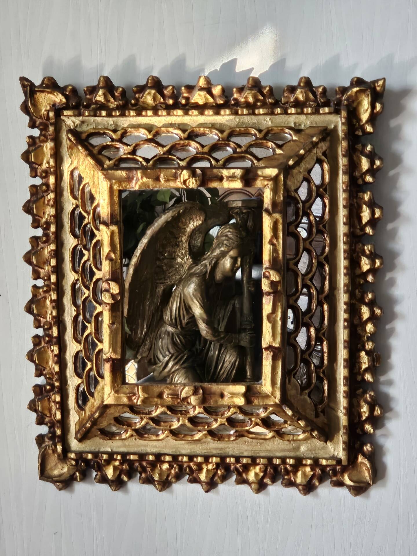 Vintage ethnic mirror, handcrafted golden wood, 1950.