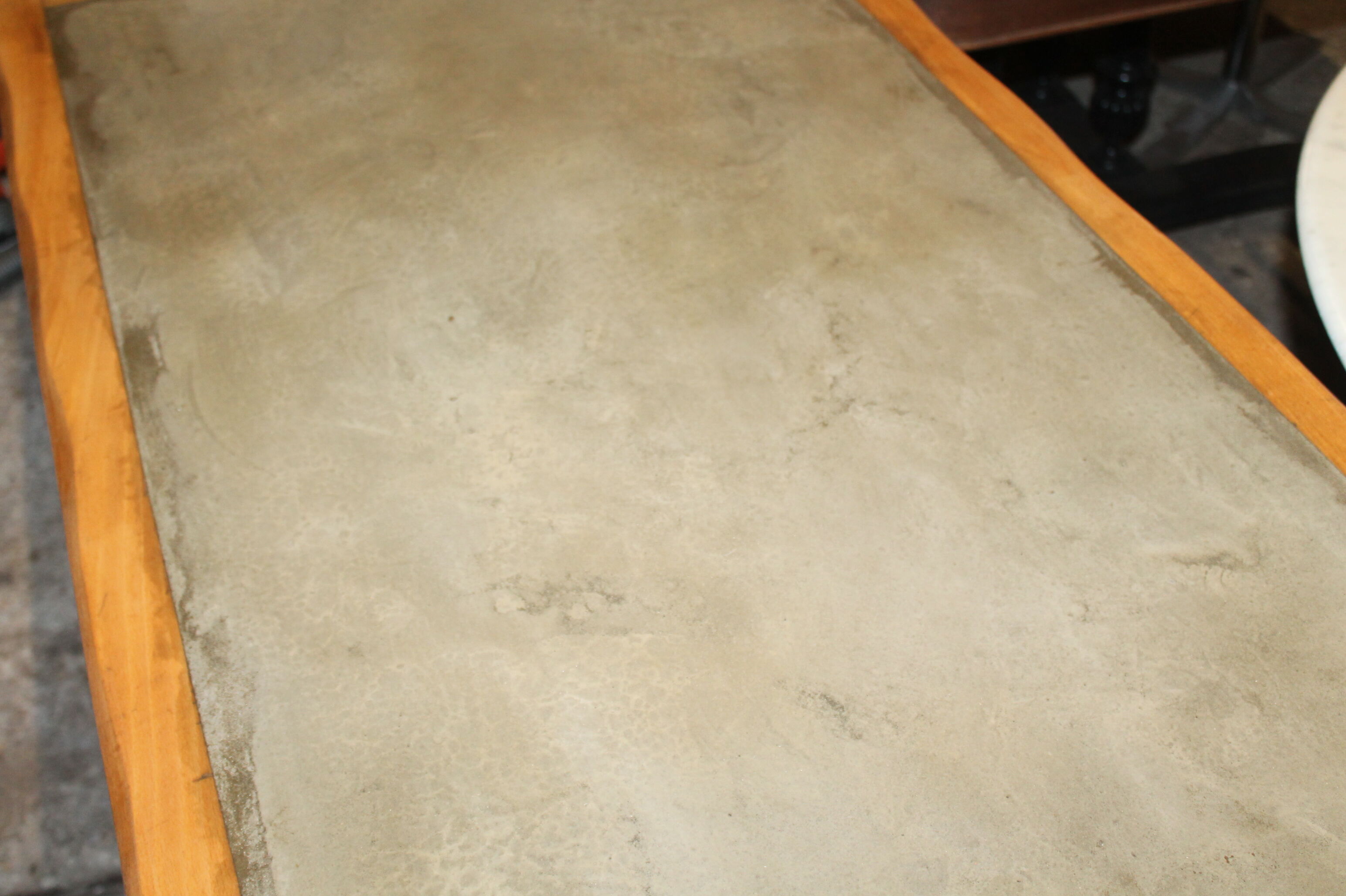 Waxed concrete top table