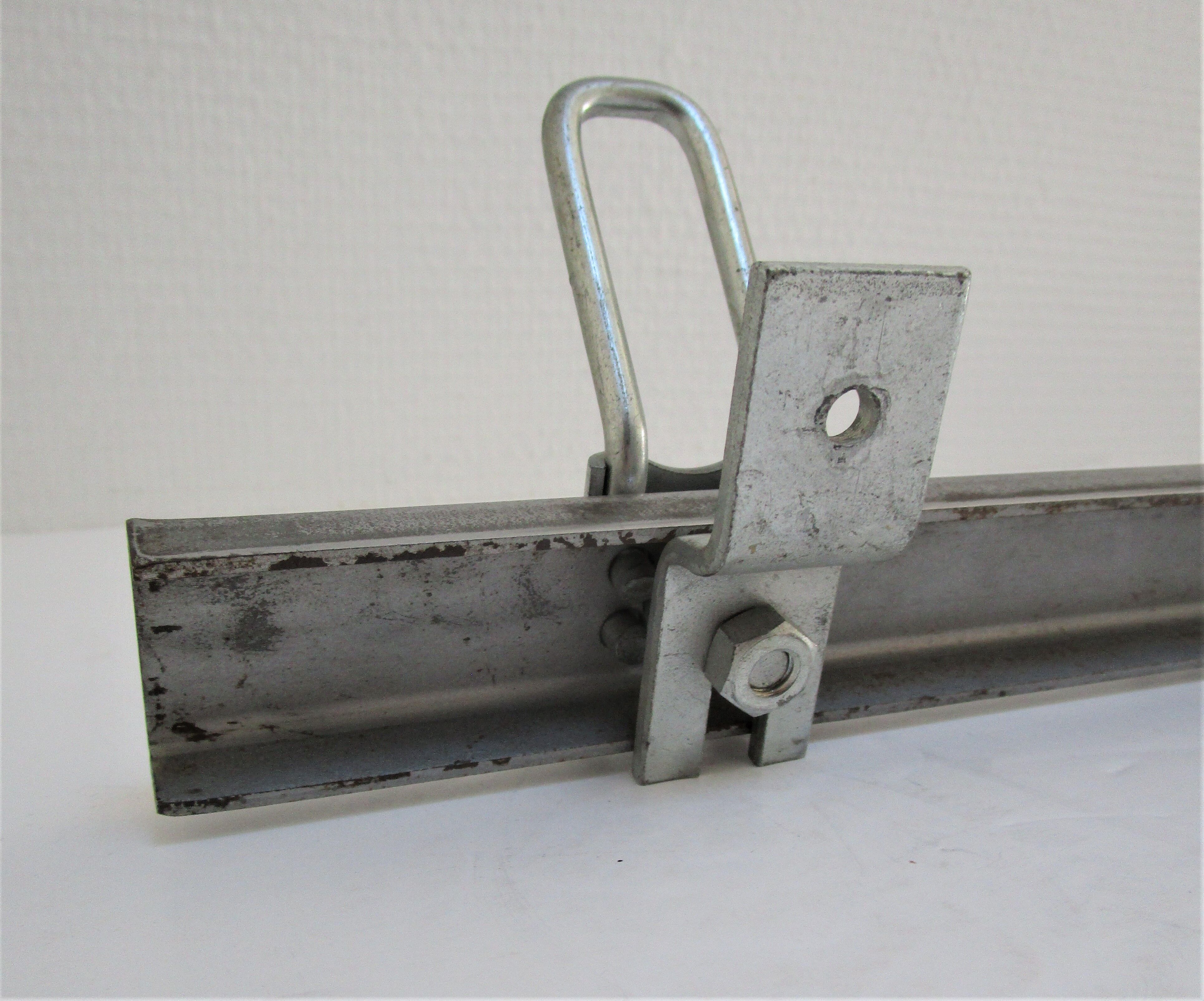 Vintage school wall rack in patinated steel