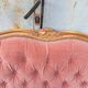 antique wooden and fabric headboard