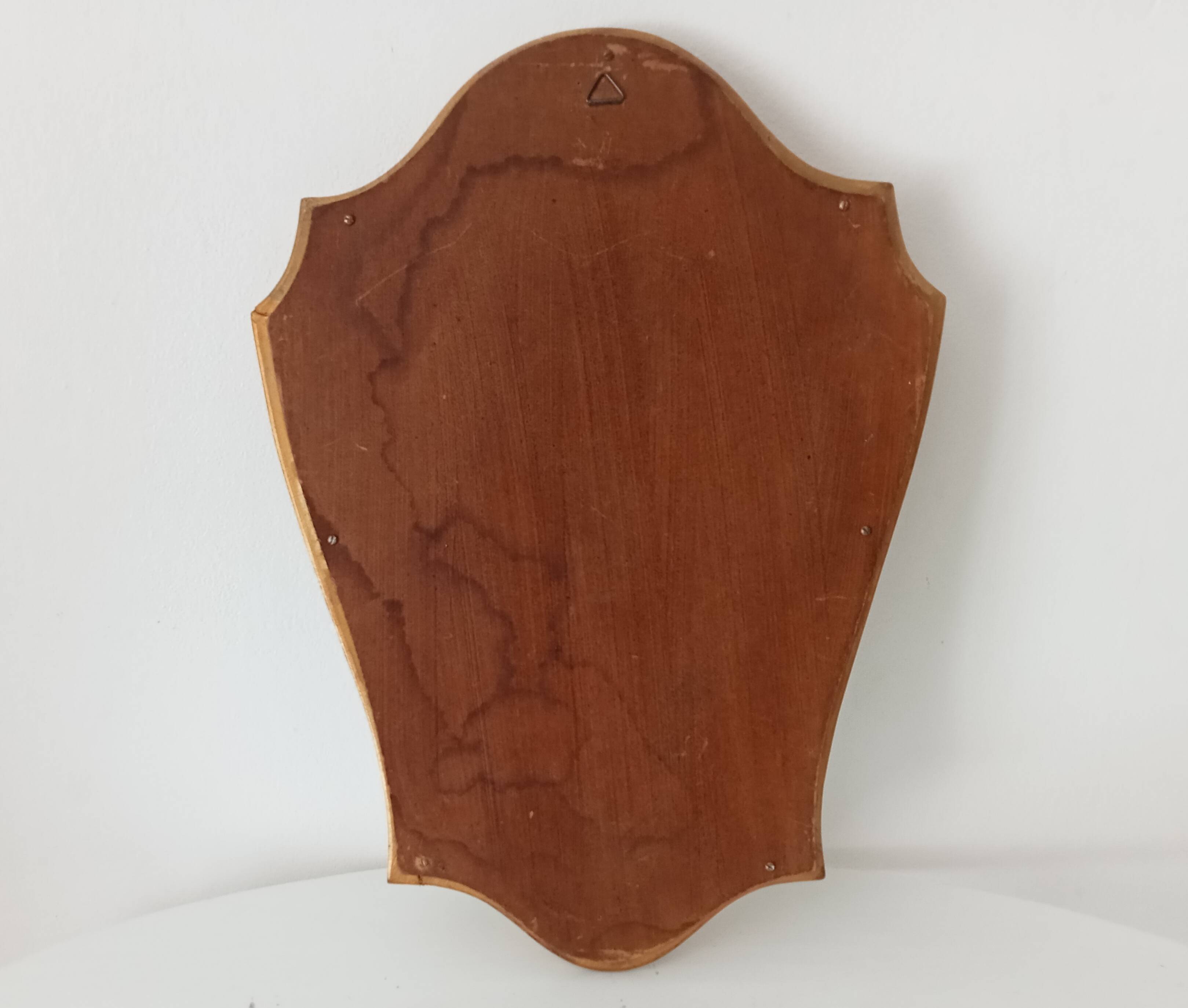 Vintage baroque mirror in gilded wood