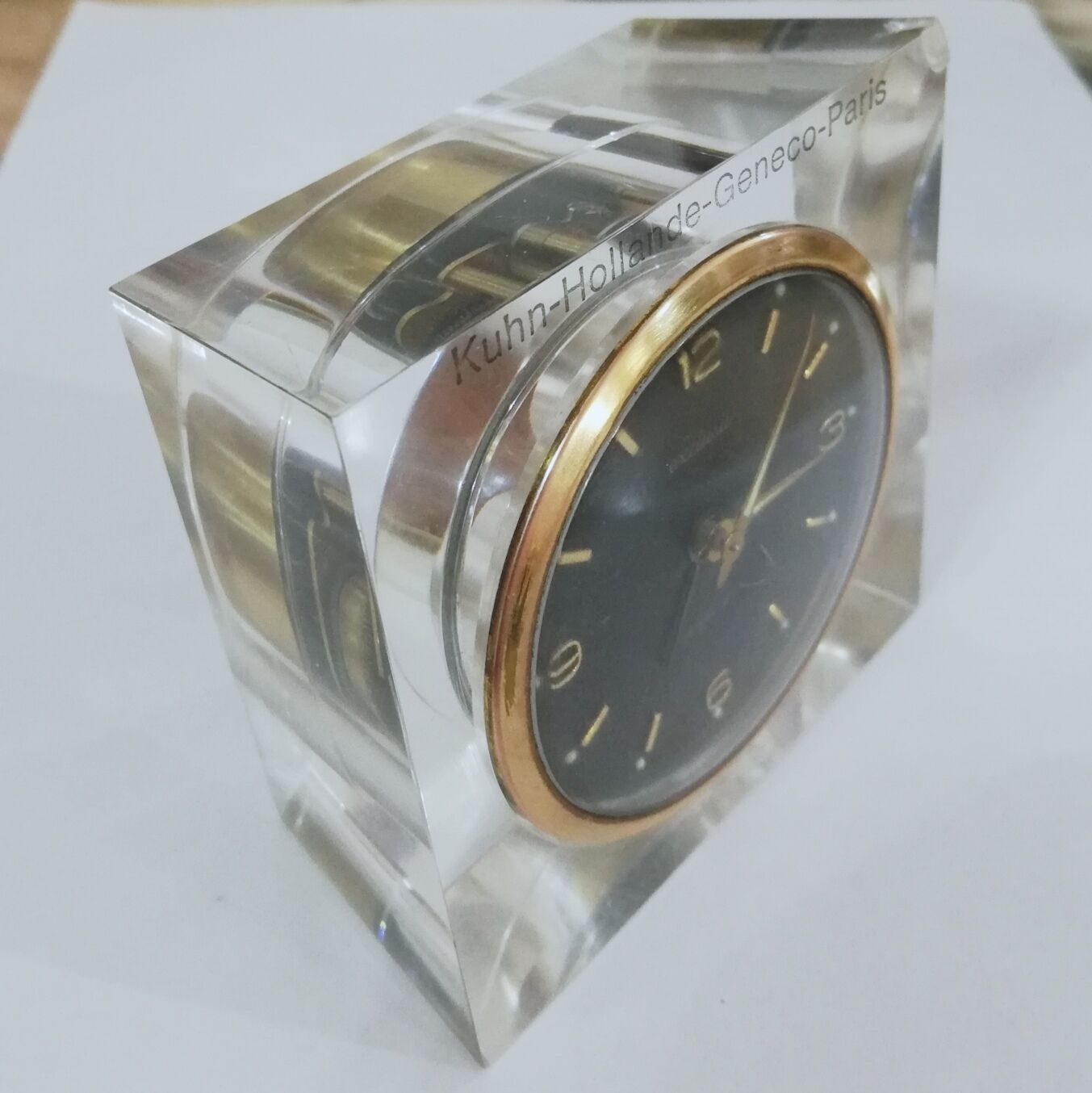 Alarm clock with exposed mechanism in plexiglass and brass