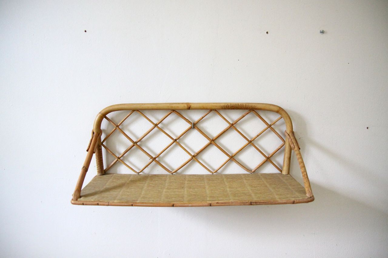 Rattan wall shelf
