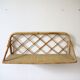 Rattan wall shelf