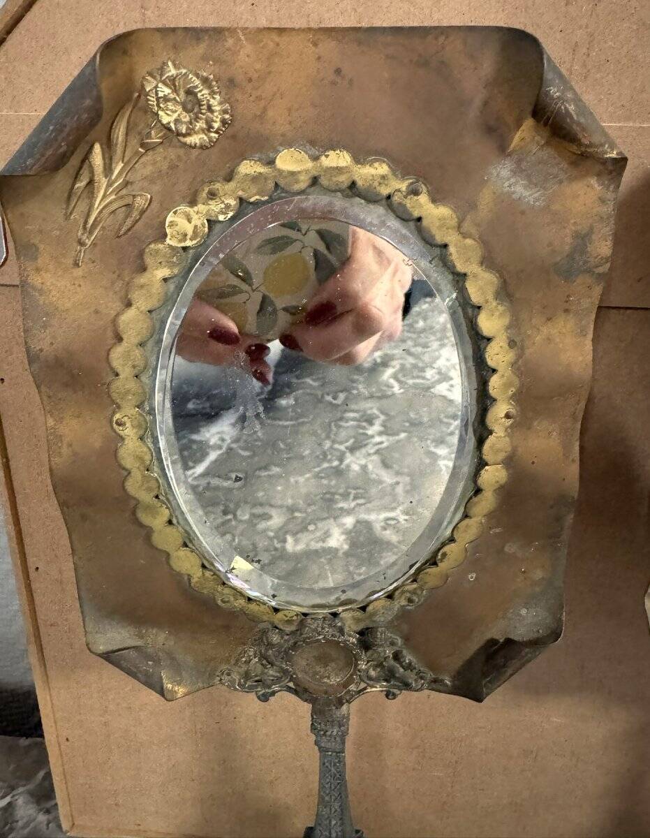Pair of brass mirrors from the Art Deco period perched on the Eiffel Tower.
