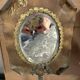 Pair of brass mirrors from the Art Deco period perched on the Eiffel Tower.