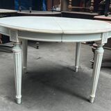 Louis XVI style table with extendable element.