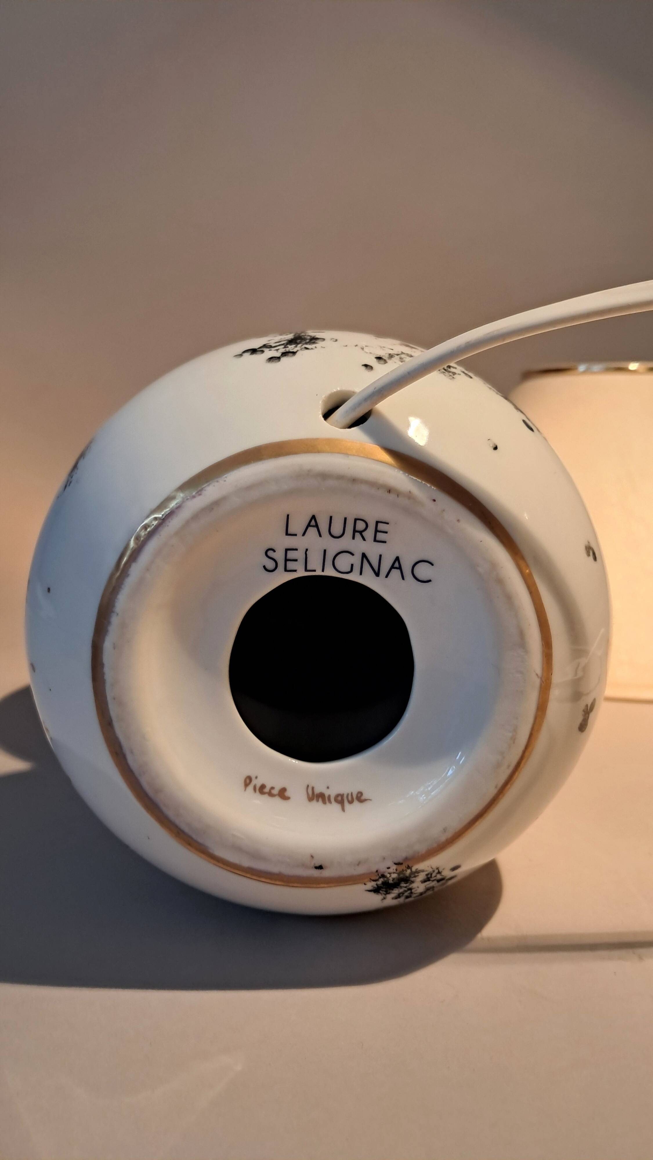 Fine porcelain lamp painted and gilded with fine gold. Laure Selignac, Paris.