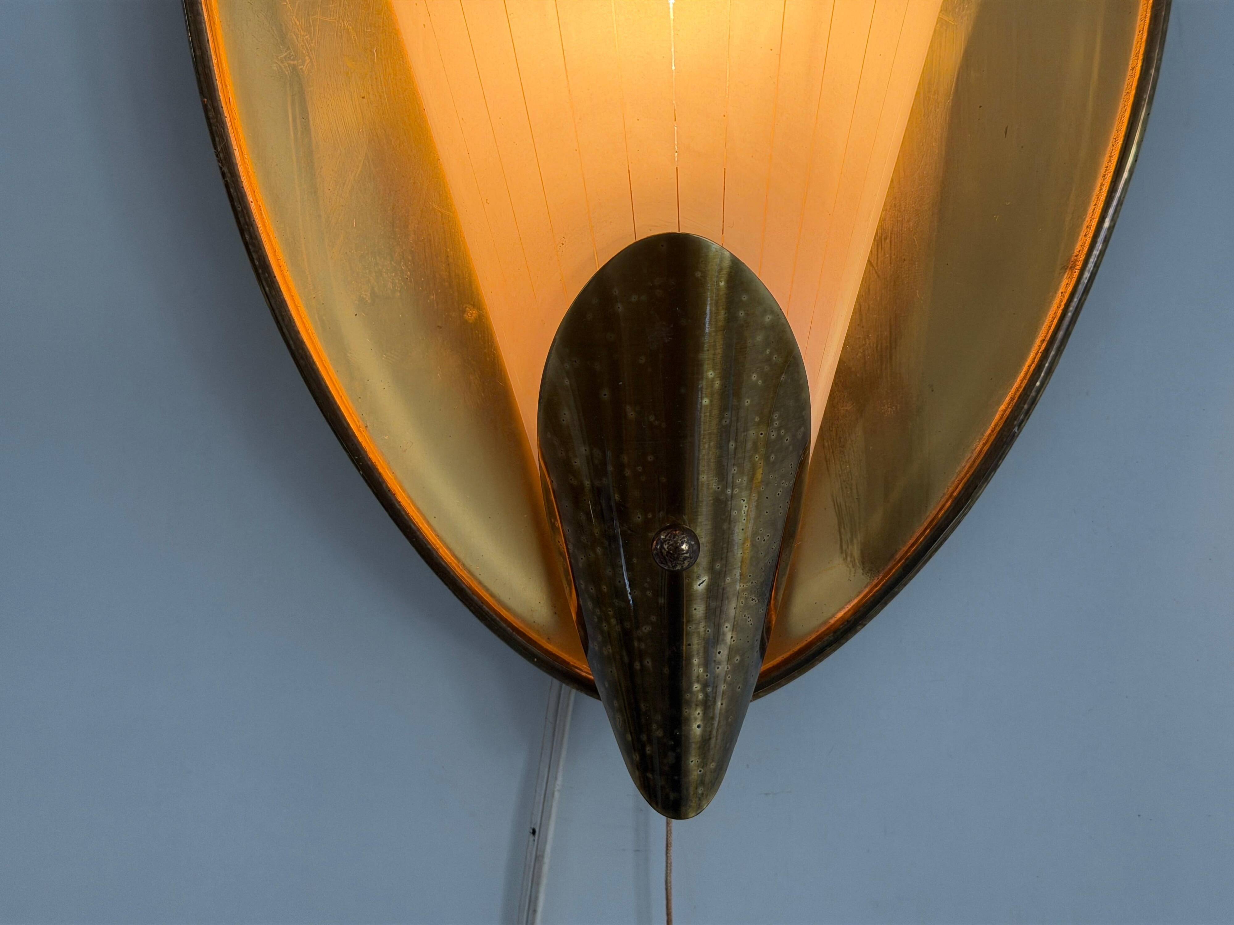 Pair of brass and glass wall lights from the mid-century, 1950s, Germany.