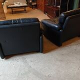 Pair of designer leather armchairs by Tobia Scarpa