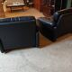 Pair of designer leather armchairs by Tobia Scarpa.