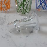 Colorful set consisting of a decanter and 7 70s liqueur glasses