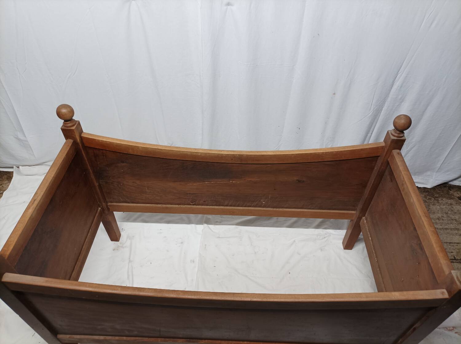 Old wooden children's bed