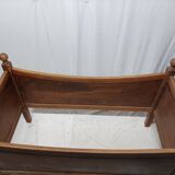 Old wooden children's bed