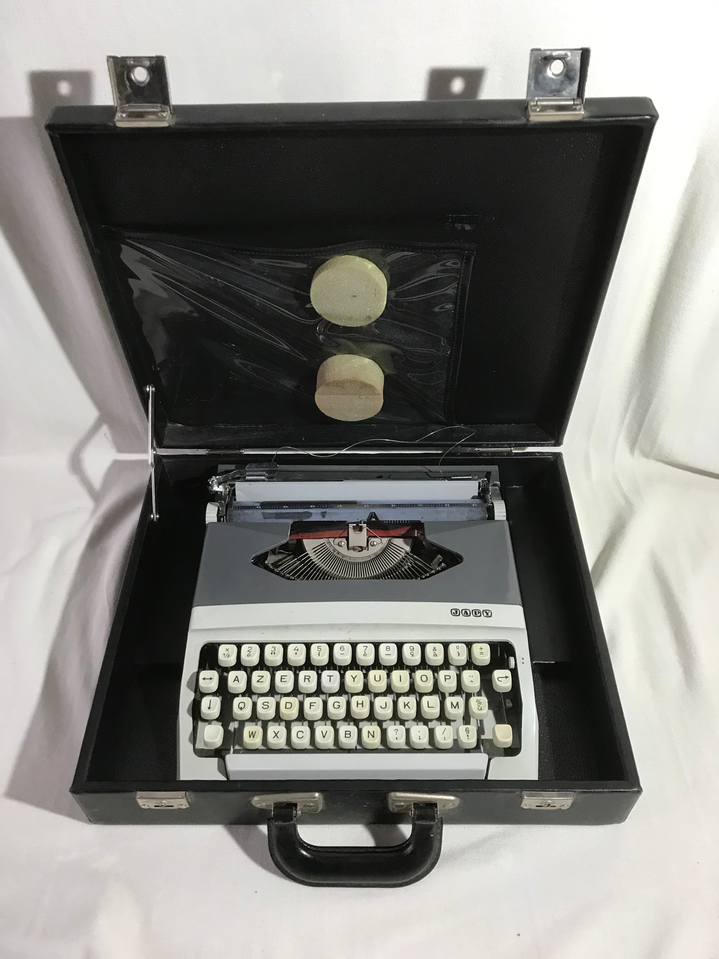 Former HJapy white metal writing machine - grey - vintage black malle