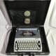 Former HJapy white metal writing machine - grey - vintage black malle