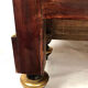 Varnished wood showcase and gold decoration in imitation of the so-called Boulle marquetry