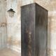 Industrial locker room in raw metal, circa 1930.