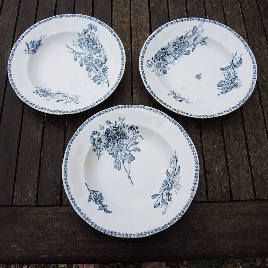 10 old deep plates made of ironstone with floral decoration