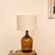 Lampe dame Jeanne et jute tissée