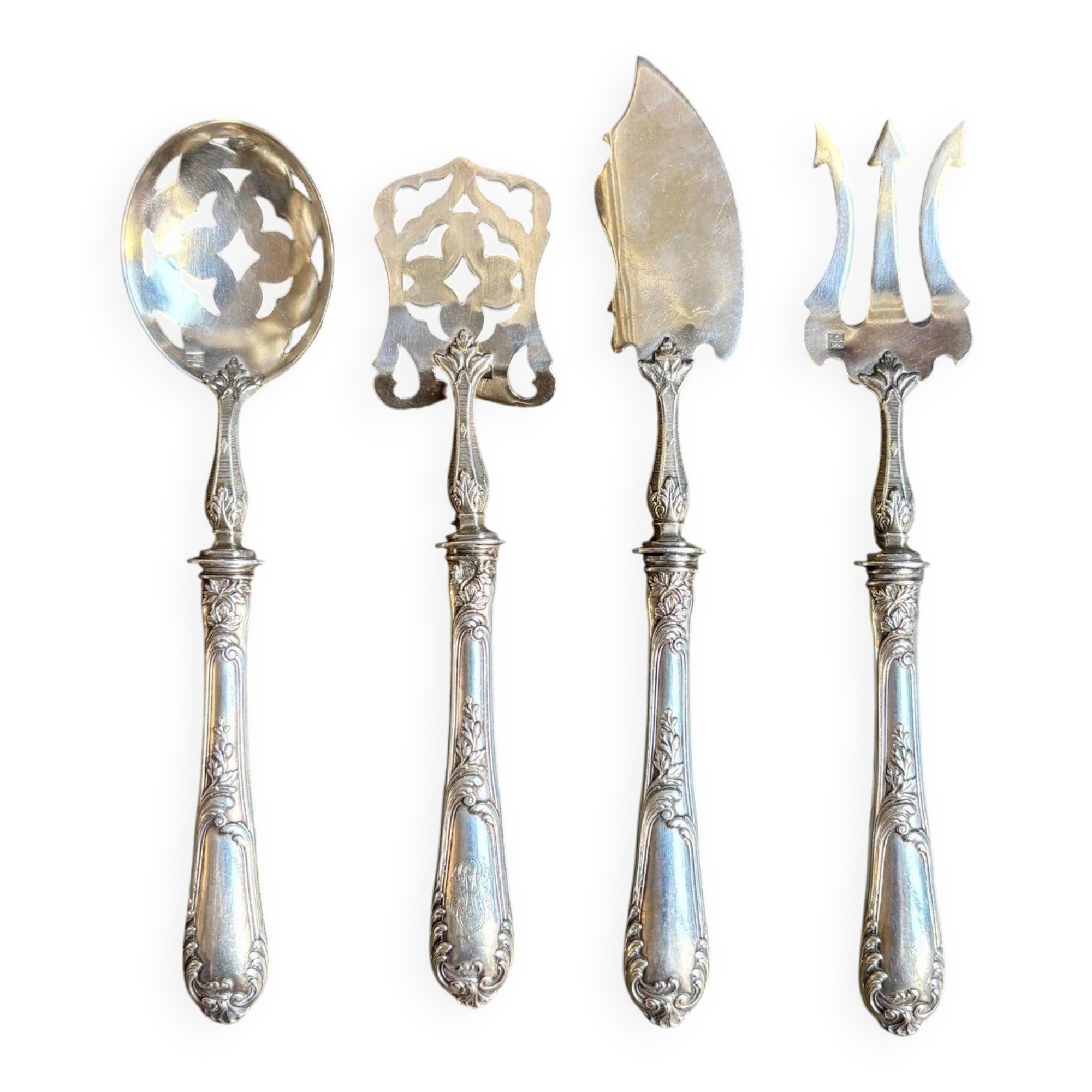 4 silver bonbon spoons engraved "HS"