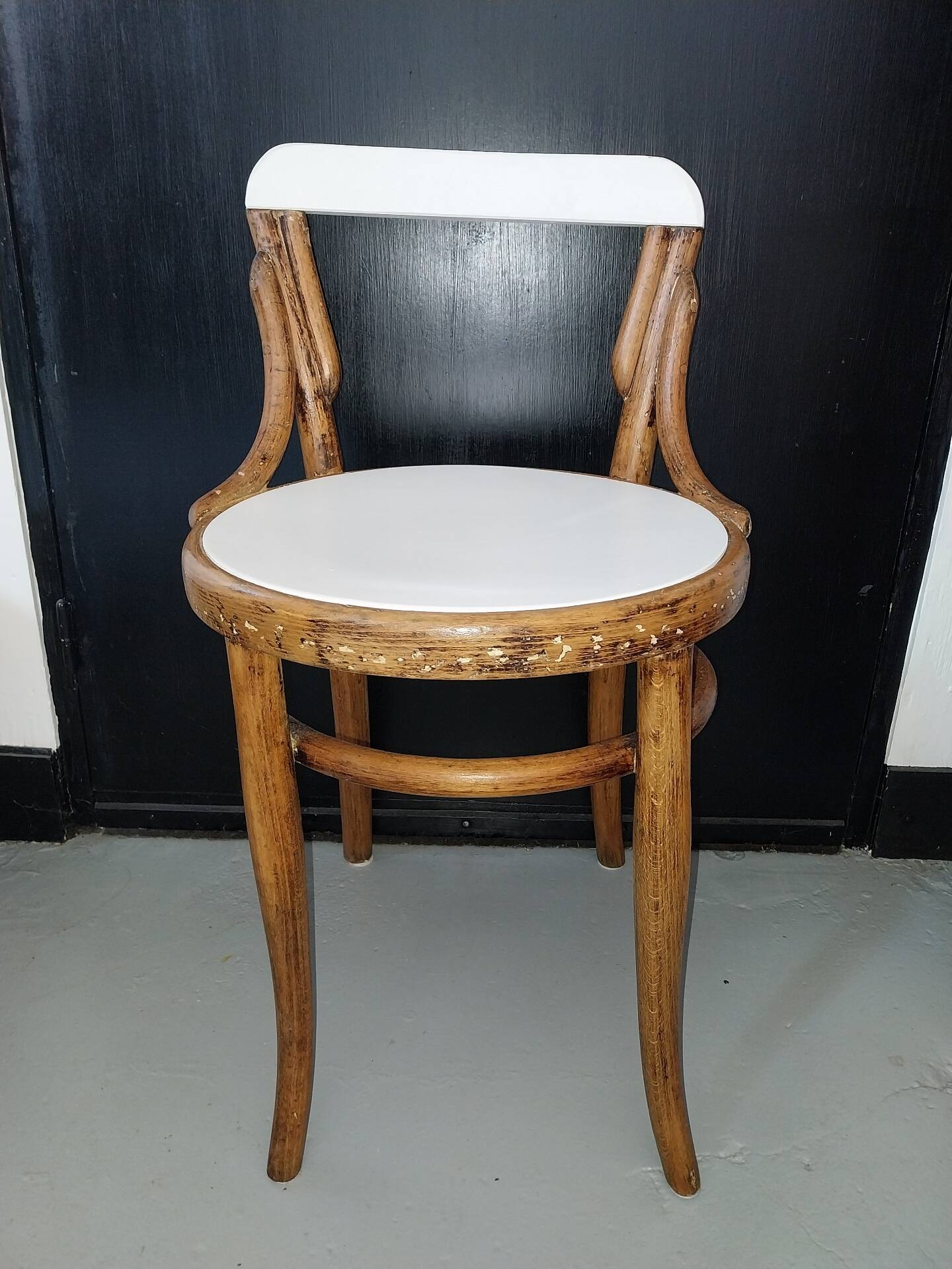 Curved wooden children's chair