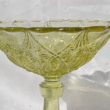 Old small cut on foot in yellow molded glass