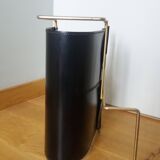 Modernist magazine rack in the style of Jacques Adnet