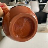 Terracotta ceramic carafe with geometric and white patterns