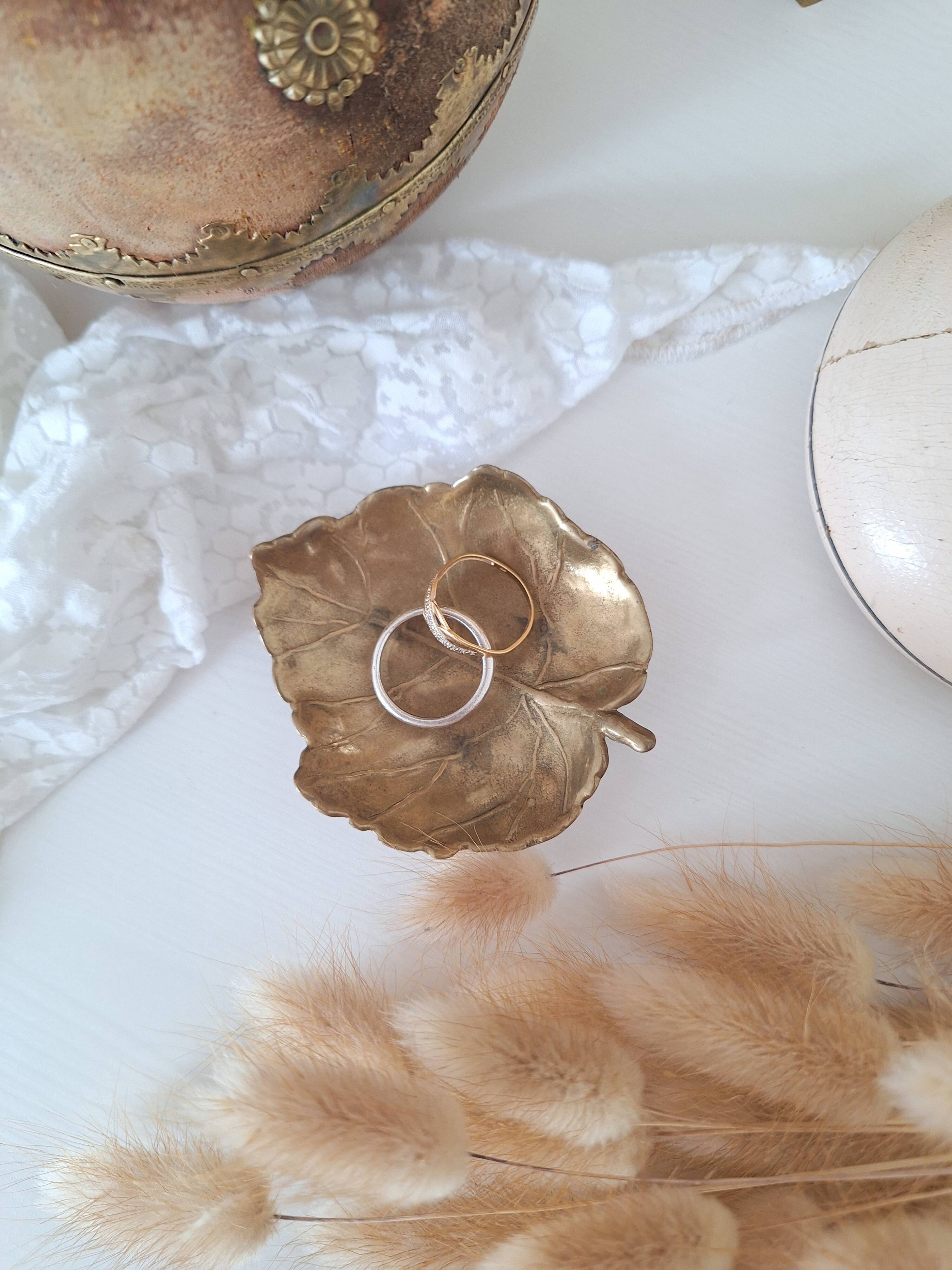 Vintage brass pocket emptier